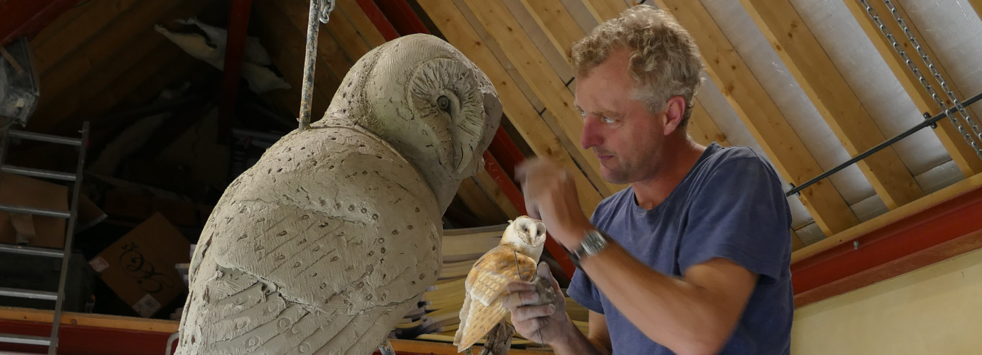 Hamish working on an owl sculpture