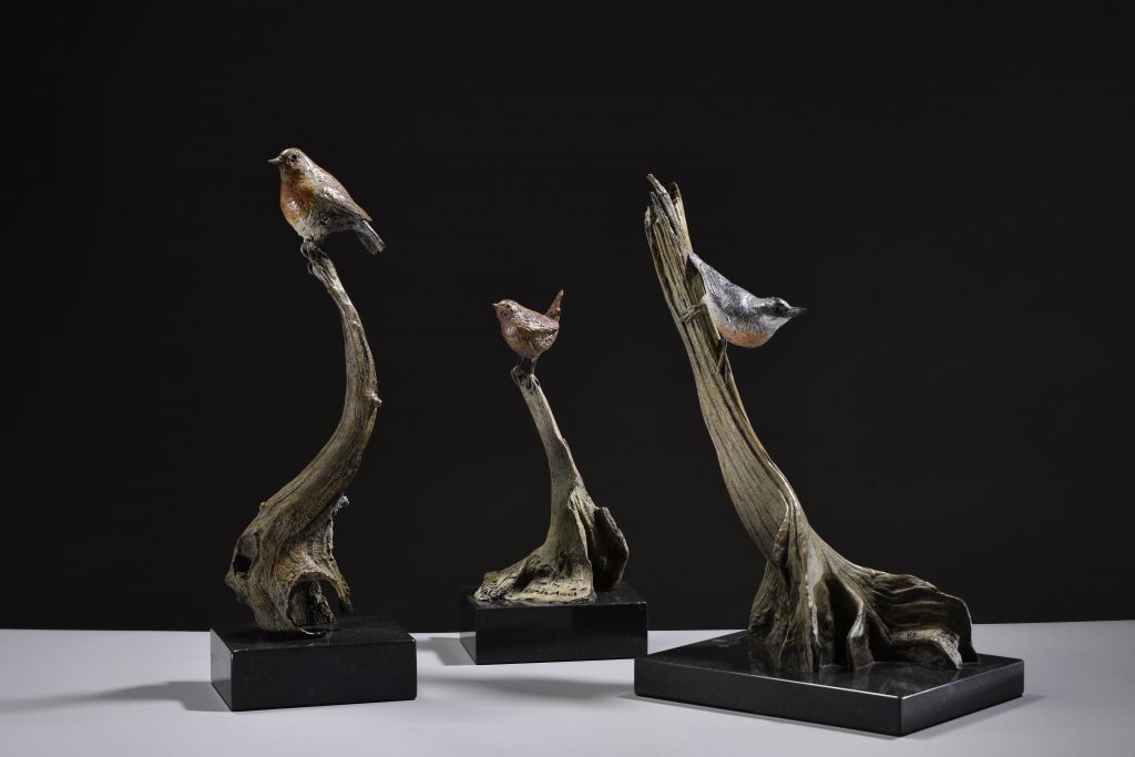 three bird sculptures by Hamish Mackie