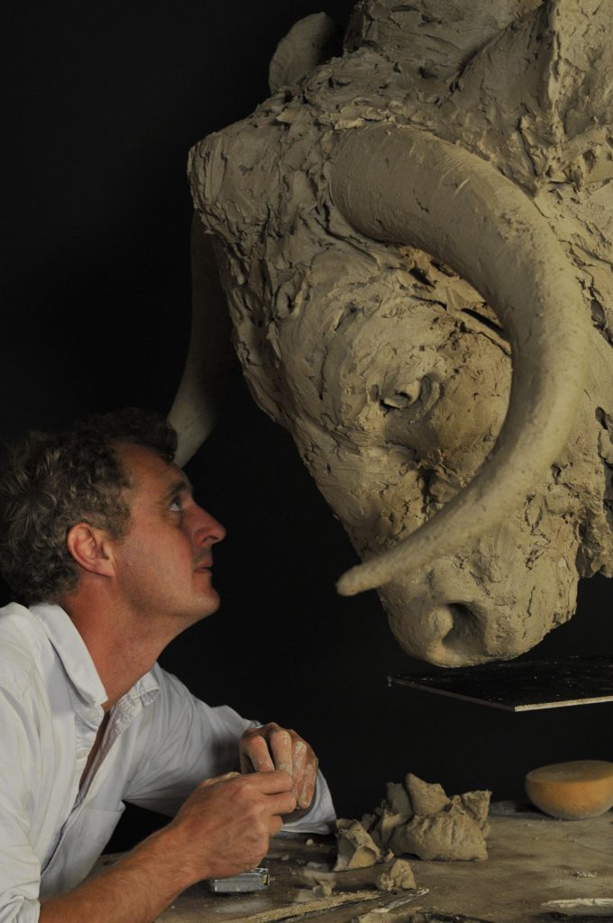 Hamish with clay model of bull head