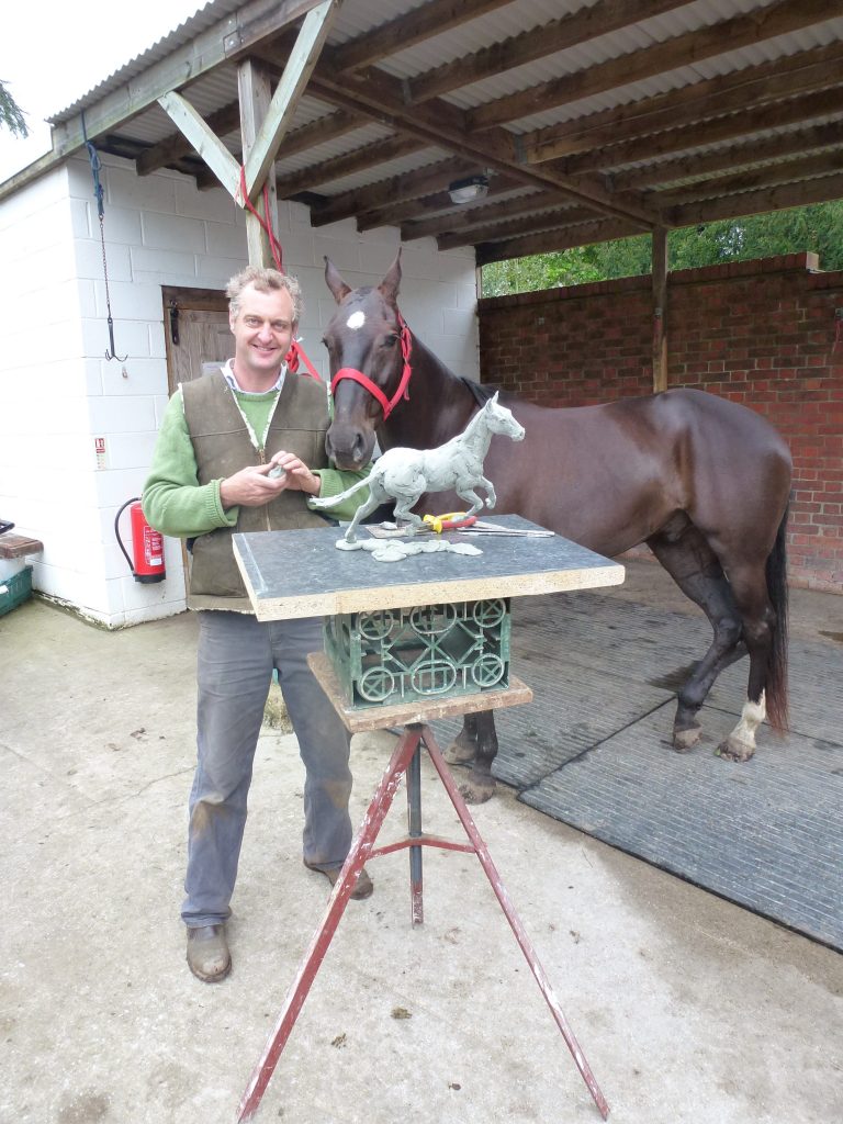 Hamish sculpting a polo pony from life