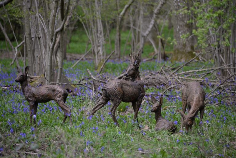 Roe deer sculptures in garden