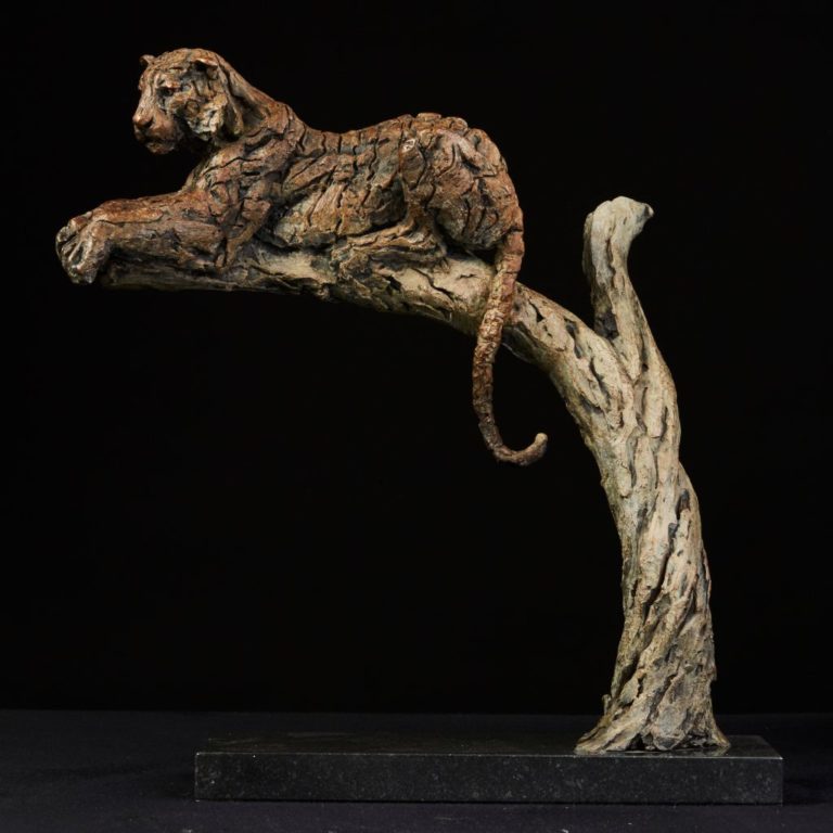 Tiger in a tree sculpture
