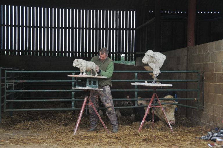 Hamish sculpting Hereford bull outdoors