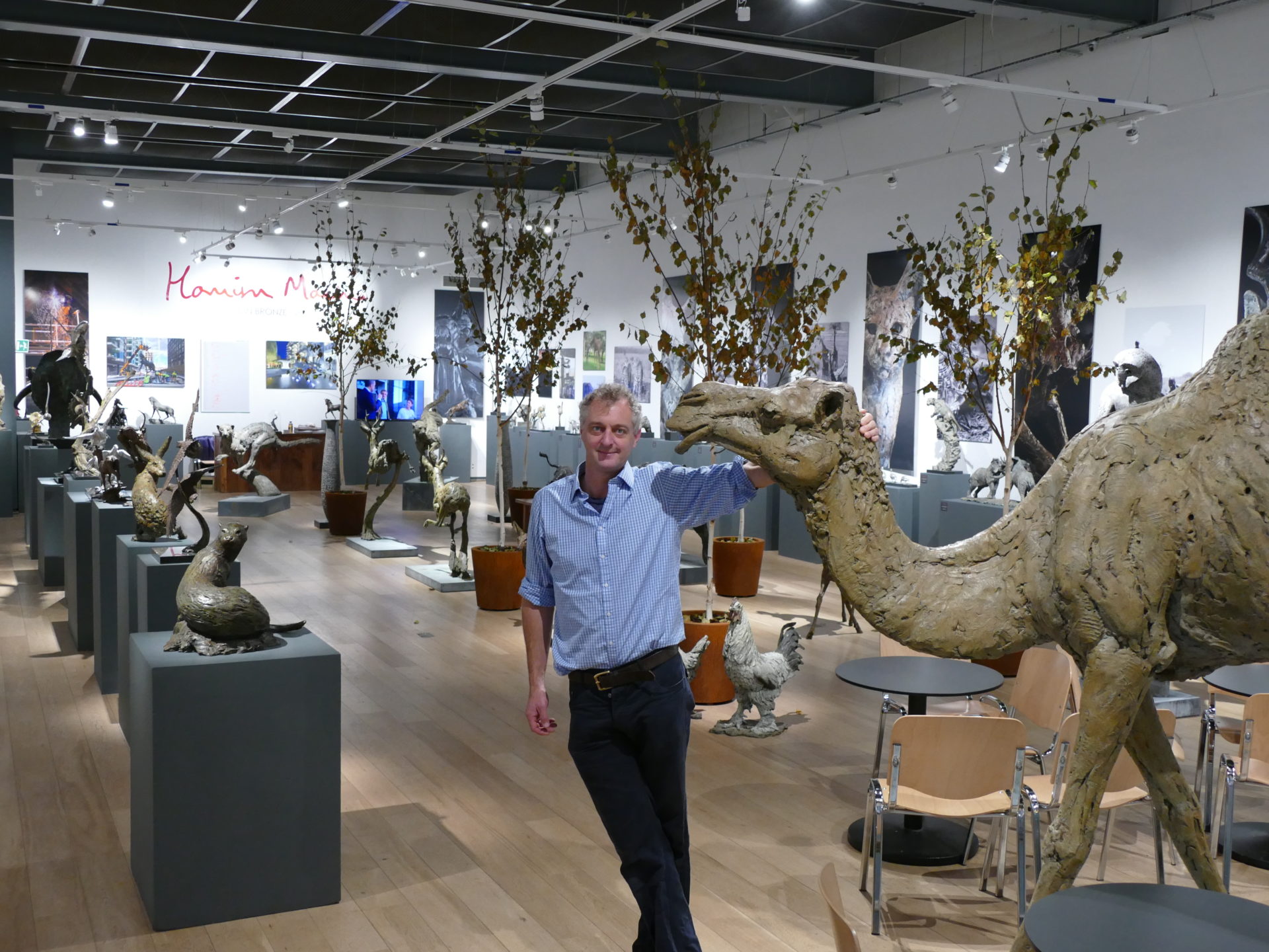 Hamish with new sculptures at exhibition