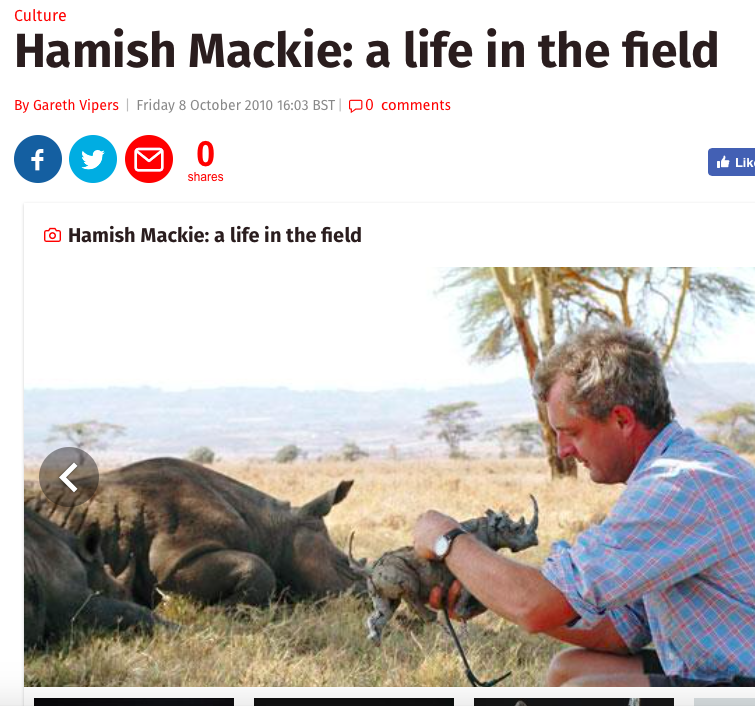 picture of Hamish Mackie with rhino shown in The Independent
