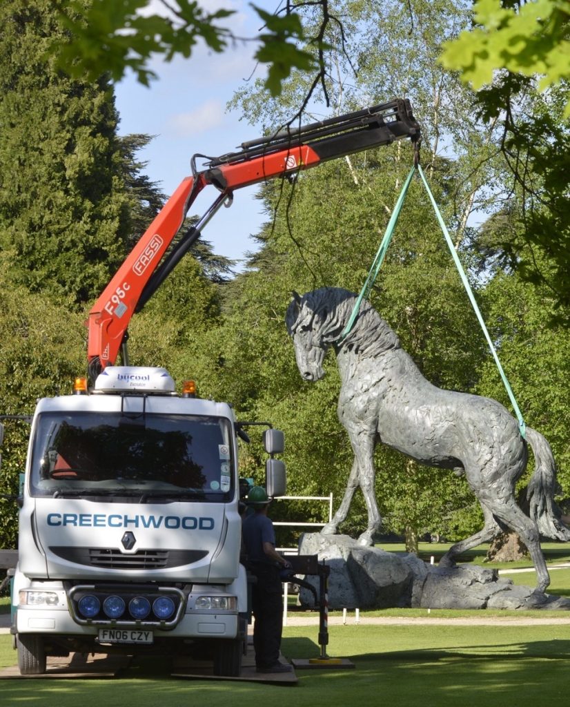 photo of horse sculpture being moved shown in Oxford Times
