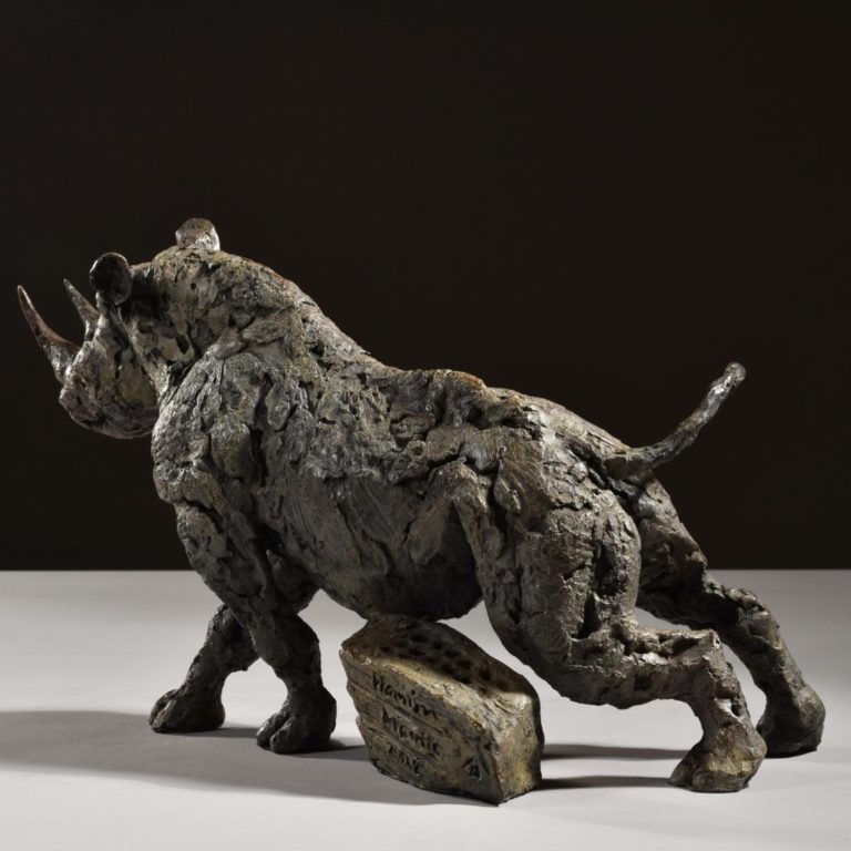 sculpture of black rhino itch