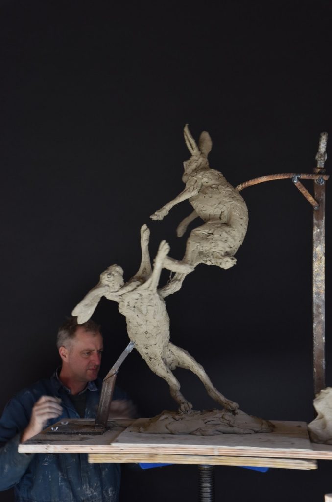making hare sculptures in workshop