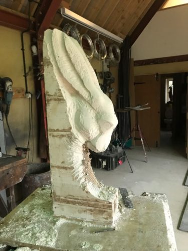 carved hare head sculpture