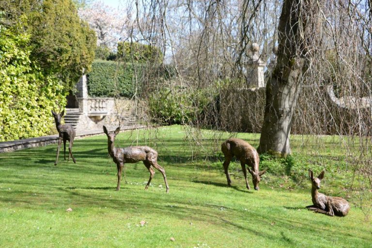 Roe deer sculpture in garden