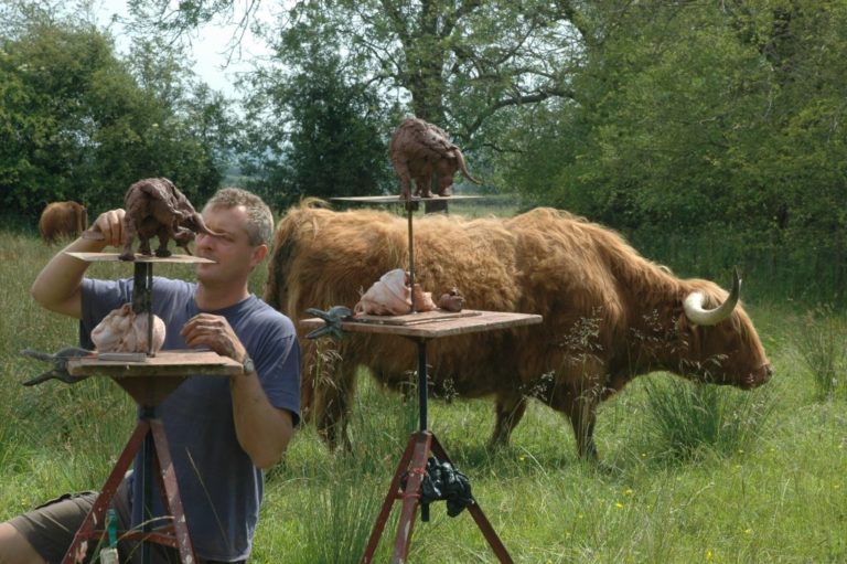 Hamish making Highland Cattle sculptures