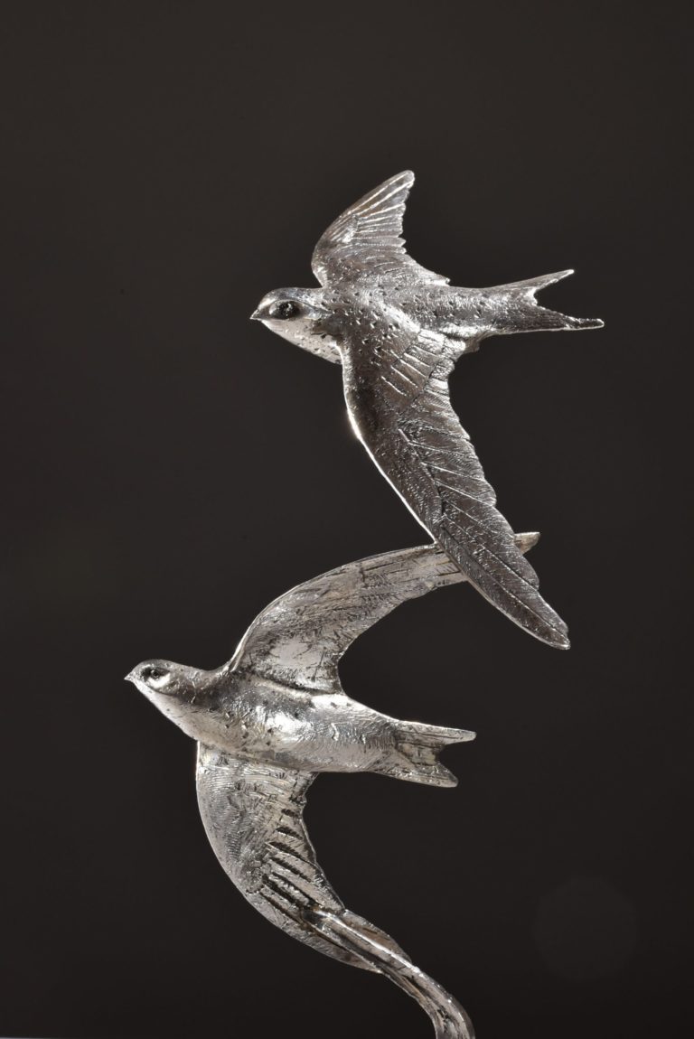 swift sculptures in silver