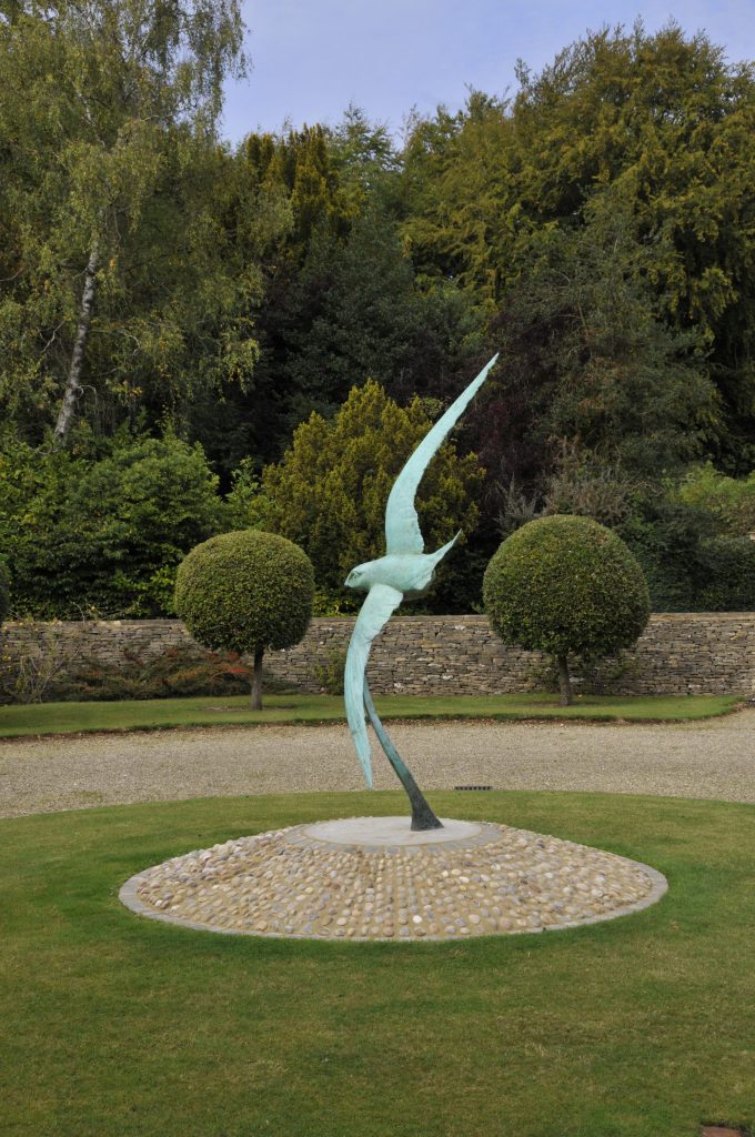 swift sculpture in garden