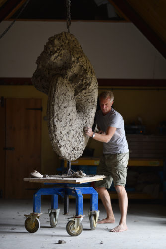 Hamish making sculpture of ammonite cretaceous