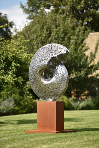 stainless steel sculpture of ammonite
