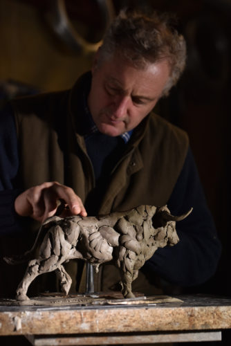 Hamish working on bull sculpture