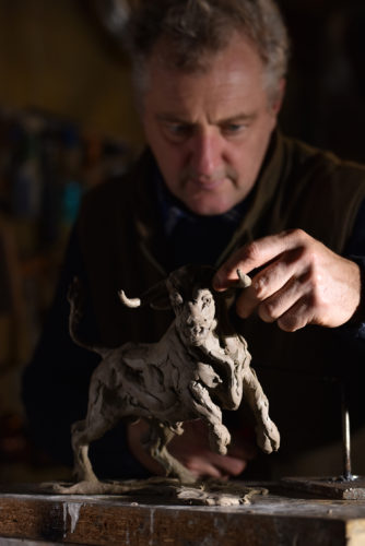 Hamish working on bronze bull sculpture