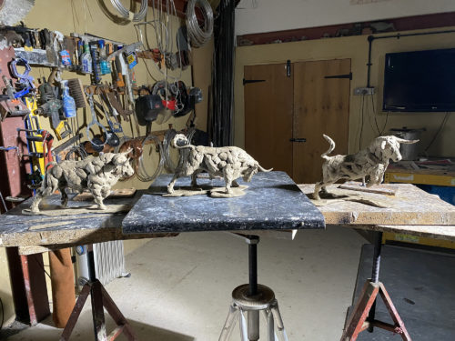 models of bull sculpture in workshop