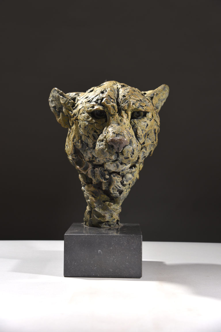 mud original cheetah head sculpture