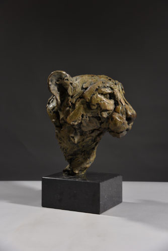 sculpture from clay of cheetah head