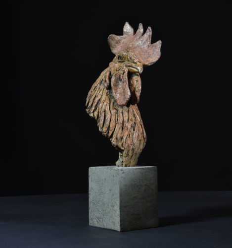 bronze chicken head sculpture
