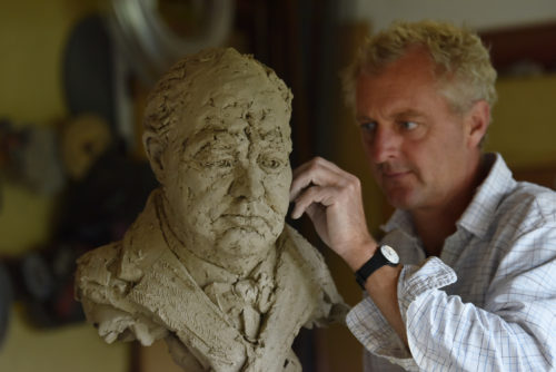 Hamish making Sir Winston Churchill sculpture