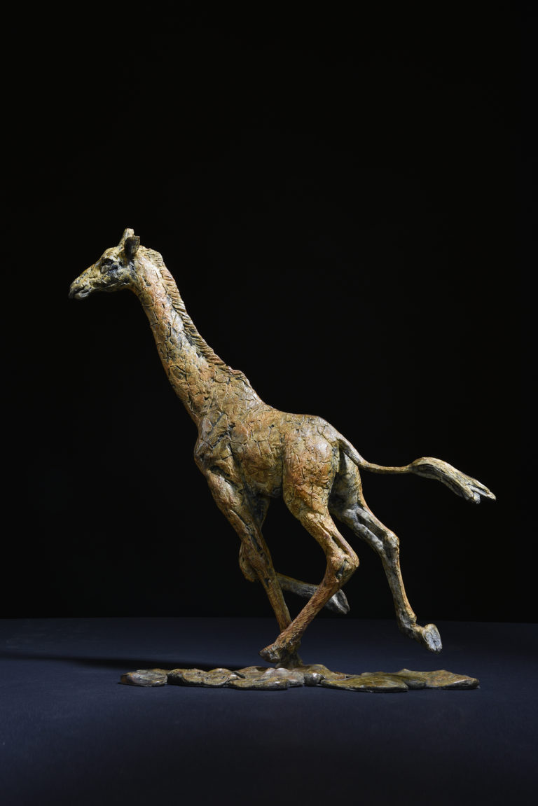 male giraffe sculpture