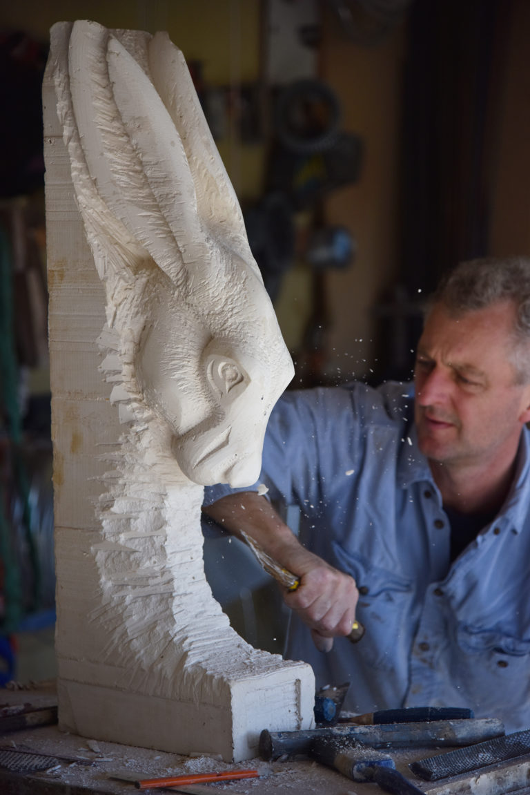 Hamish carving hare head sculpture