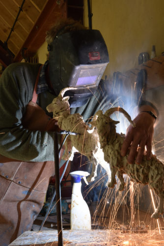 Hamish making Highland Goats sculpture