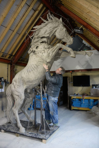 Hamish making Arab Stallion sculpture