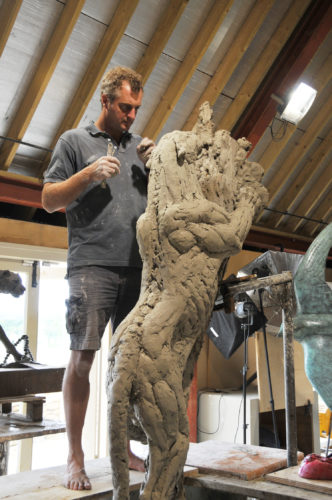 Hamish making life size leopard sculpture