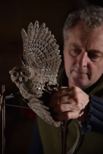 Hamish working on owl sculpture
