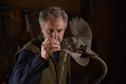 Hamish creating owl sculpture