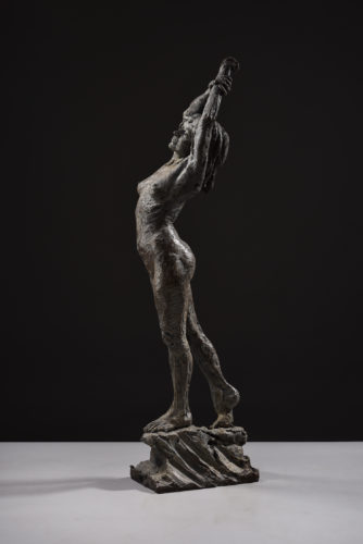 bronze nude stretching