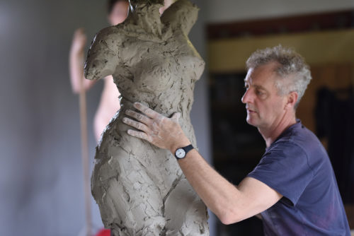 Hamish creating nude sculpture
