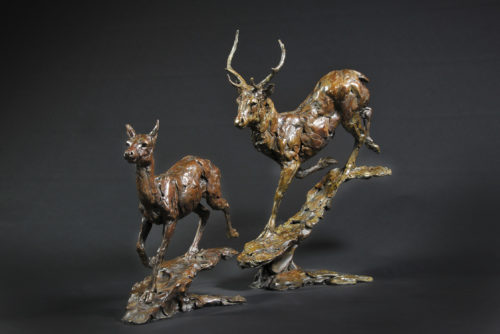 pair of deer sculptures