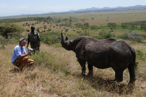 Hamish with wild black rhino