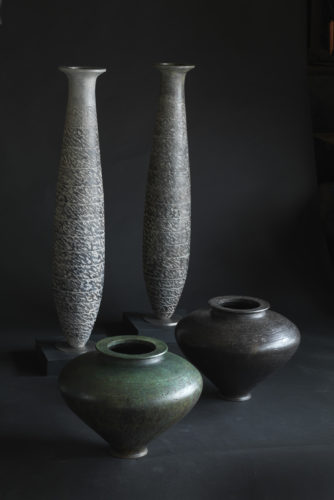 four bronze vessels by Hamish Mackie