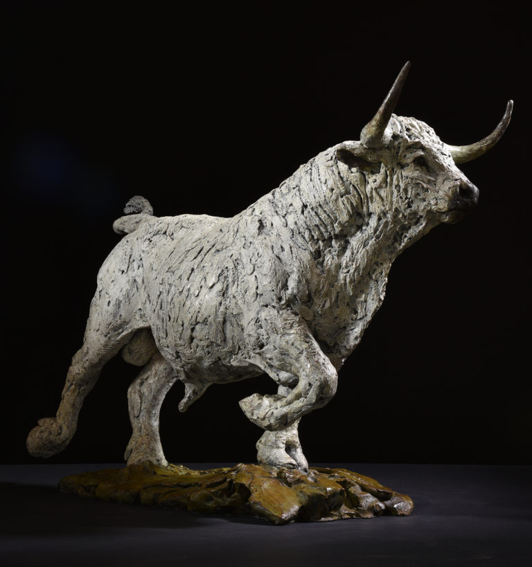 sculpture of white park bull
