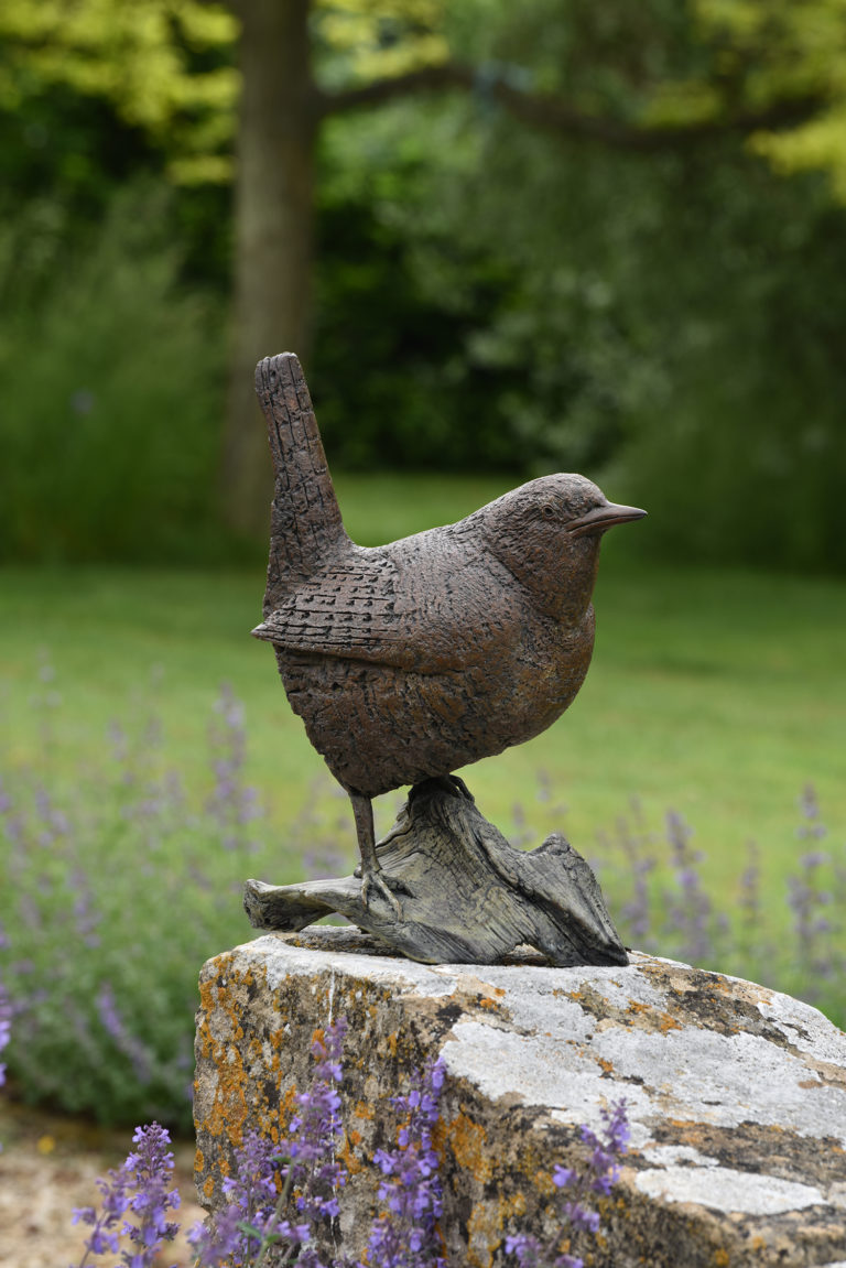 large bronze wren sculpture
