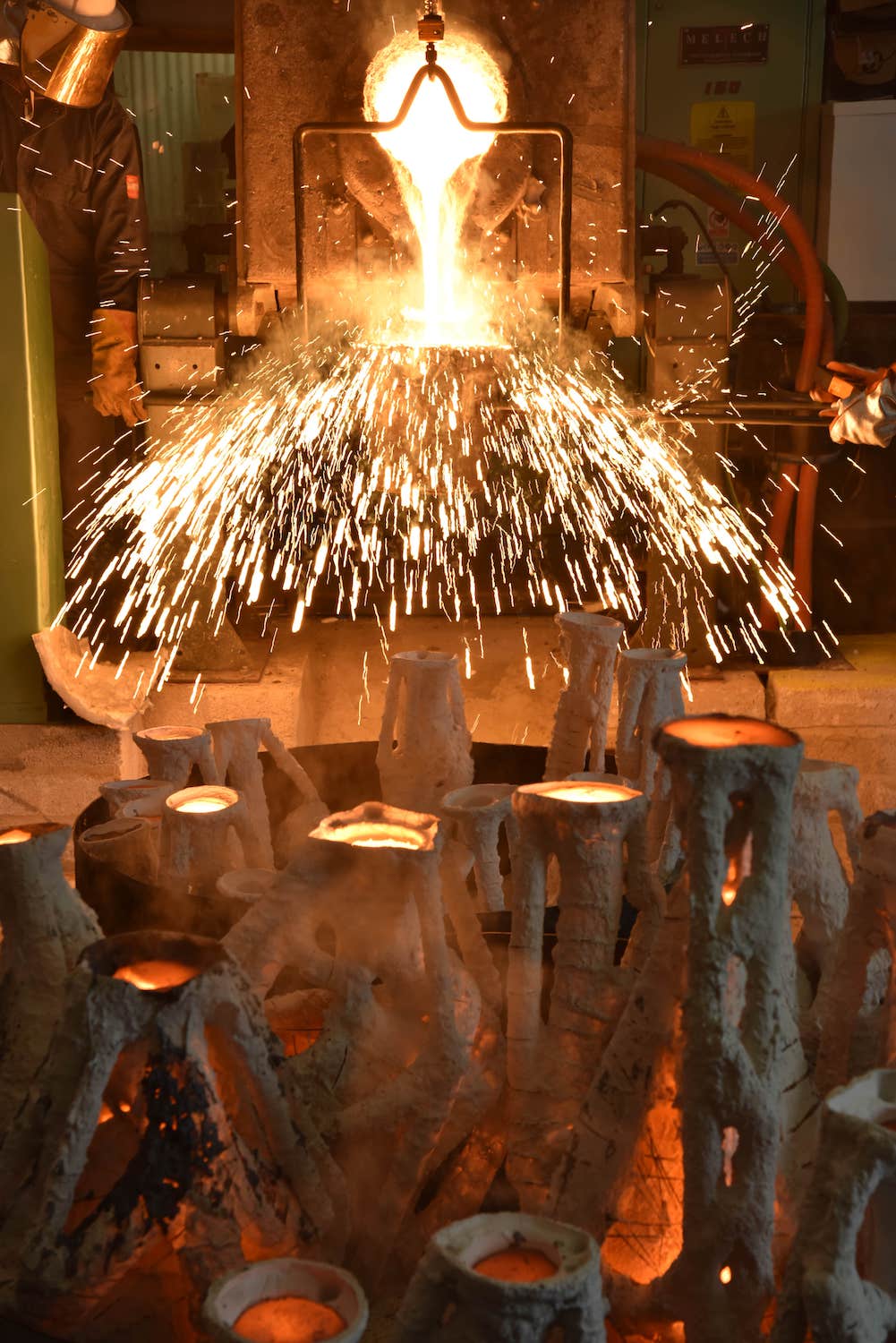 sparks flying during bronze casting