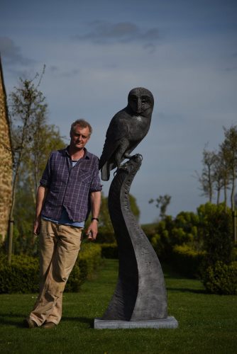 Hamish with owl sculpture