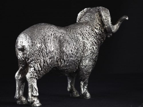Sculpture of silver merino ram