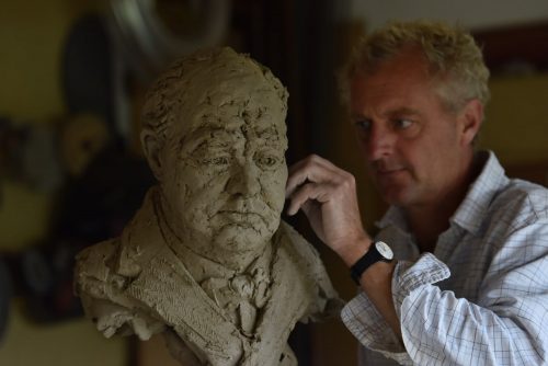 Hamish making clay model of Churchill sculpture