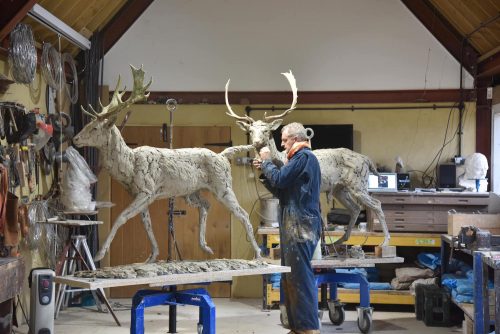Hamish making Fallow deer sculptures