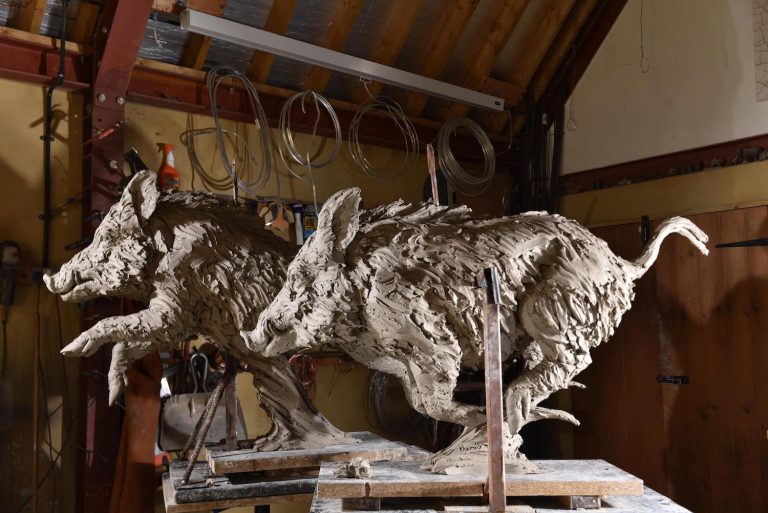 clay model of bronze wild boar sculpture pair in clay
