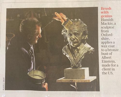 Daily Telegraph image of Hamish working on Einstein sculpture
