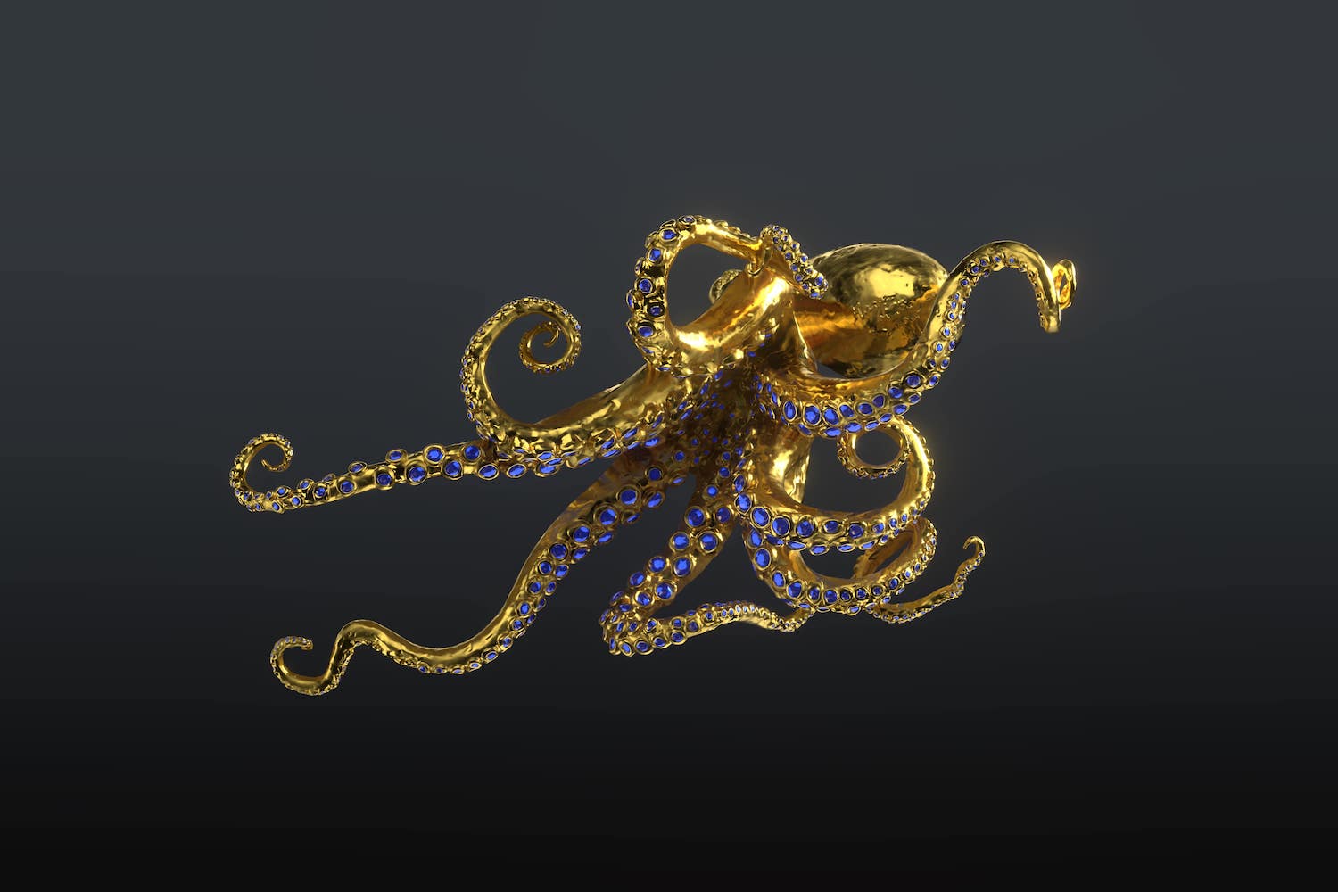 Gold Octopus by Hamish Mackie with blue sapphires