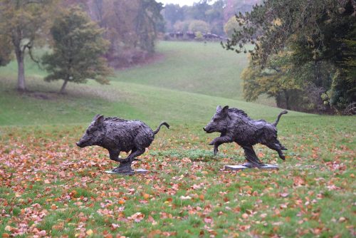 two bronze wild boar life-size