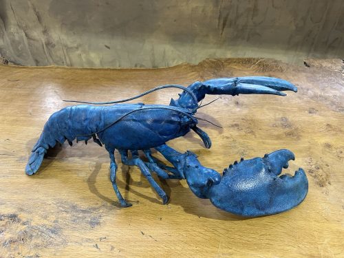 bronze sculpture of blue lobster